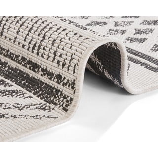 Črno-krem zunanja preproga NORTHRUGS Biri, 80 x 250 cm