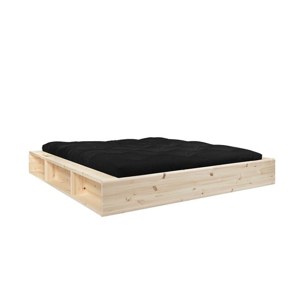 Zakonska postelja iz masivnega lesa s prostorom za shranjevanje in črnim futonom Double Latex Karup Design Ziggy, 180 x 200 cm