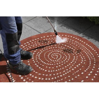 Rdeča zunanja preproga NORTHRUGS Bali, ⌀ 140 cm