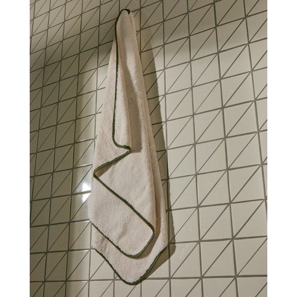 Bela/zelena frotirna bombažna brisača 70x140 cm Sedora – Kave Home-image-1
