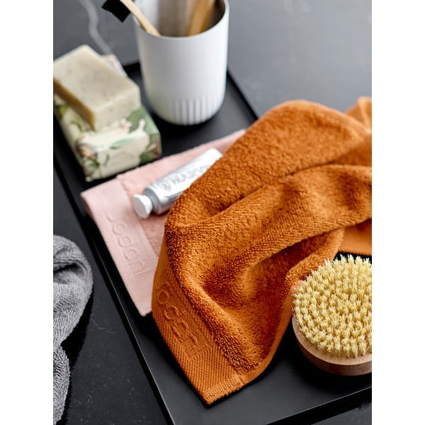 Oranžna frotirasta bombažna brisača Södahl Clay, 100 x 50 cm-image-1