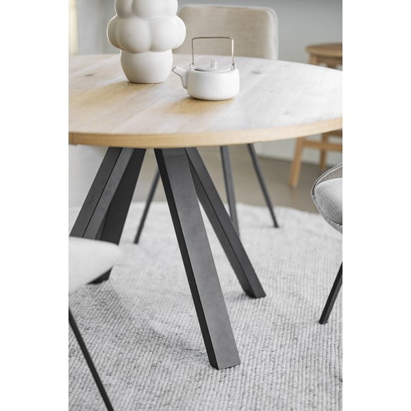 Okrogla raztegljiva jedilna miza v hrastovem dekorju ø 135 cm Maddock – Rowico-image-1