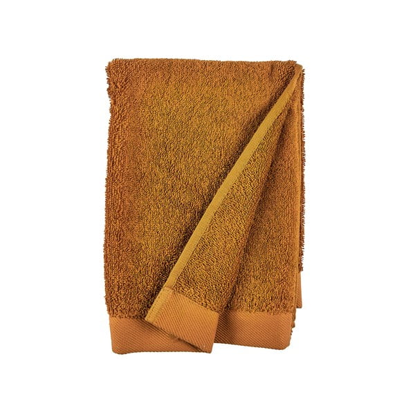 Oranžna frotirasta bombažna brisača Södahl Clay, 100 x 50 cm