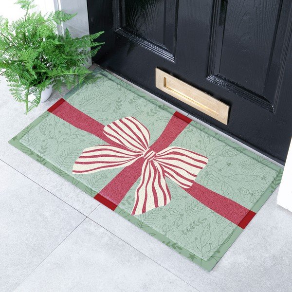 Predpražnik z božičnim motivom iz reciklirane plastike 40x70 cm Red & White Stripe Bow – Artsy Doormats-image-1