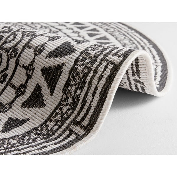 Črno-krem zunanja preproga NORTHRUGS Coron, ø 140 cm-image-1