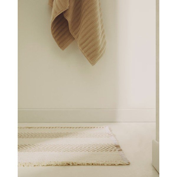 Bež kopalniška preproga 50x70 cm Bina – Kave Home-image-1