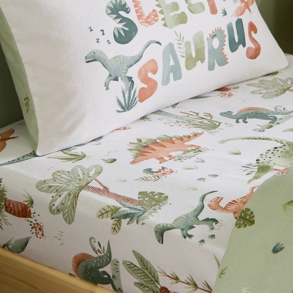 Kremno bela napenjalna enojna flanelna otroška rjuha 90x190 cm Brushed Sleepy Saurus Dino – Catherine Lansfield
