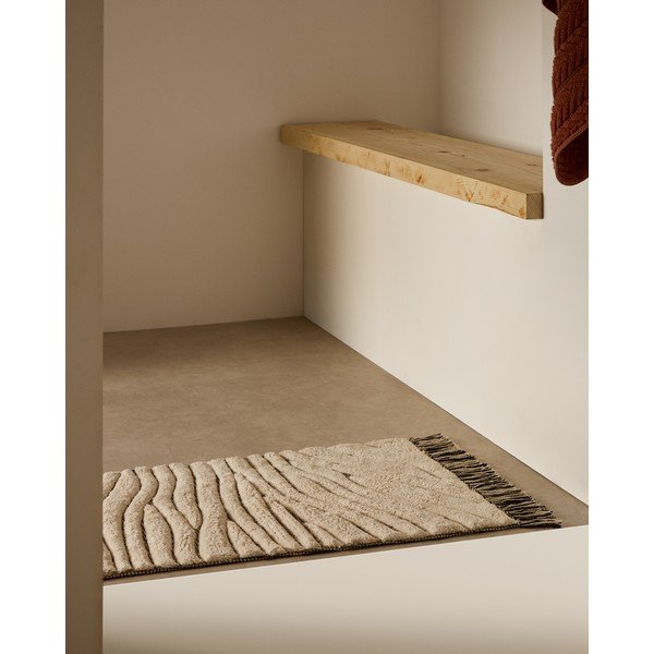 Bež kopalniška preproga 50x70 cm Crilda – Kave Home-image-1
