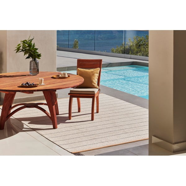 Oker rumena/kremno bela notranja in zunanja preproga 140x200 cm Belle Ochre – Pappelina-image-1