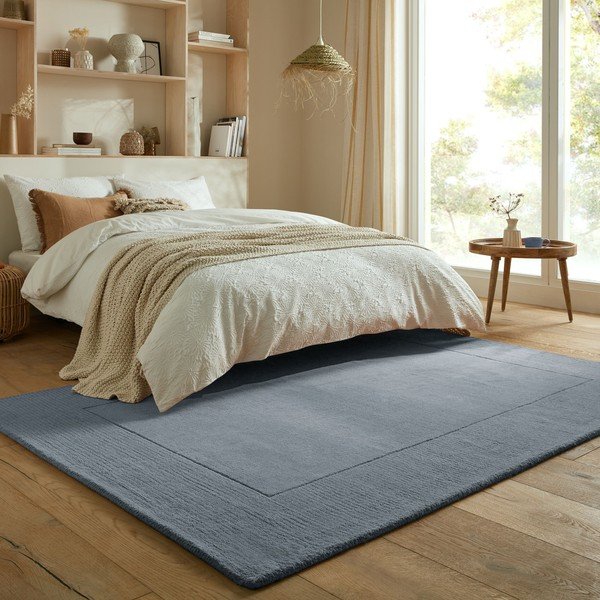 Temno modra ročno tkana volnena preproga 120x170 cm Textured Wool Border – Flair Rugs-image-1