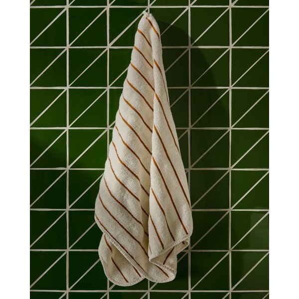 Oranžna/bež frotirna bombažna brisača 50x90 cm Dorane – Kave Home-image-1